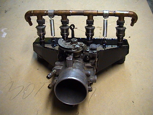The Mk II fuel rail mounted on the Mk III manifold.